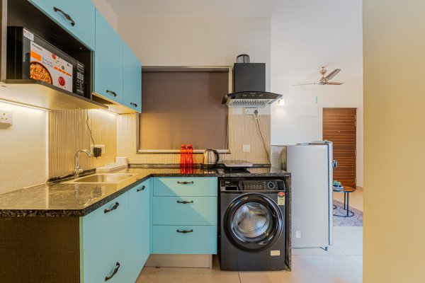 Sereno Pebbles 2 - cosy 1bhk w/pool, gym, games