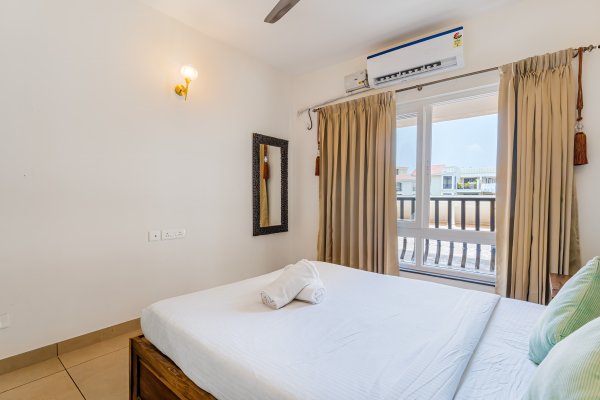 Sereno Pebbles 2 - cosy 1bhk w/pool, gym, games