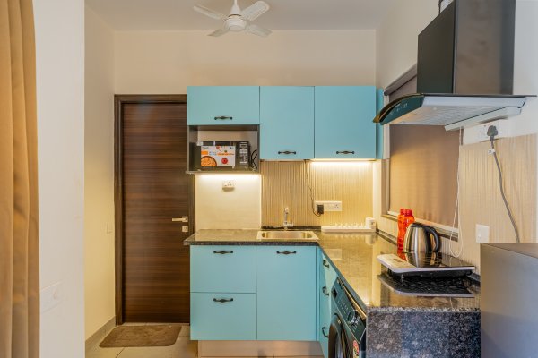Sereno Pebbles 2 - cosy 1bhk w/pool, gym, games