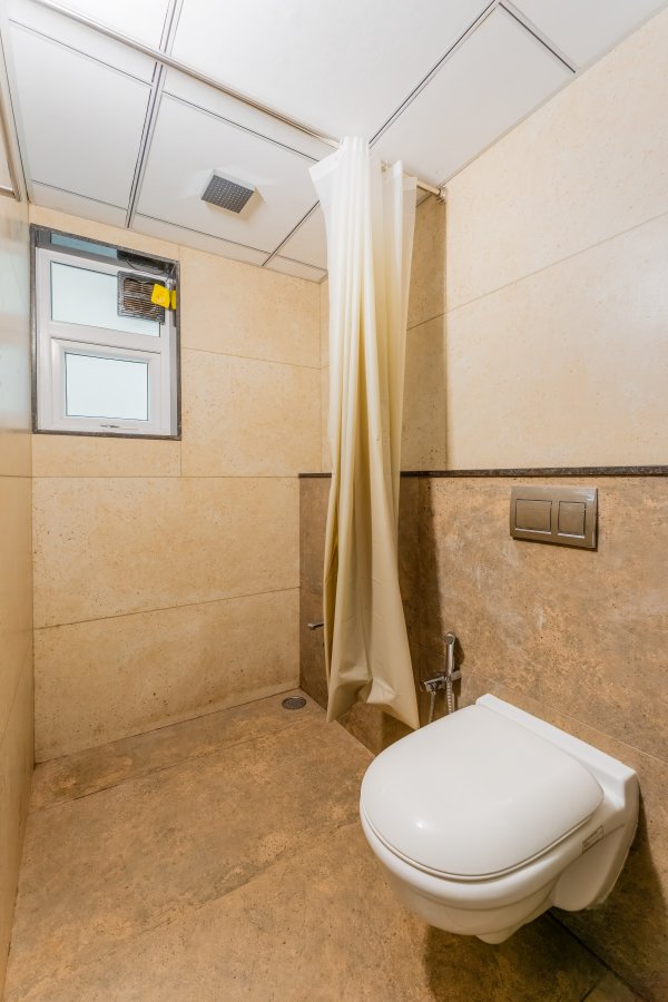 Sereno Pebbles 1 - cosy 1bhk w/pool, gym, games