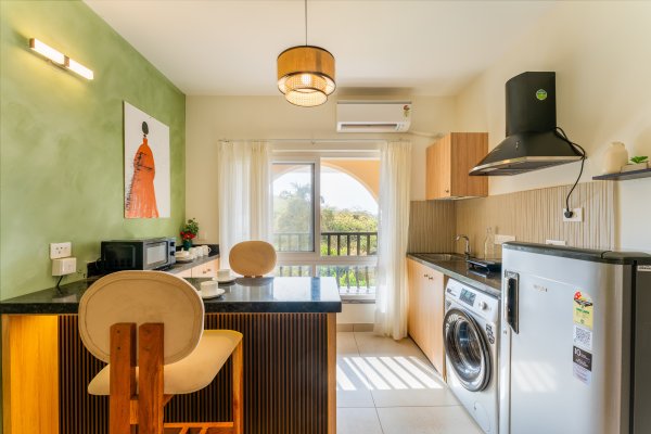 Sereno Olive - modern 1bhk w/pool, gym, games zone