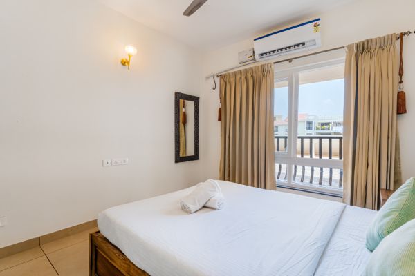 Sereno Pebbles 2 - cosy 1bhk w/pool, gym, games