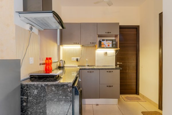 Sereno Pebbles 1 - cosy 1bhk w/pool, gym, games